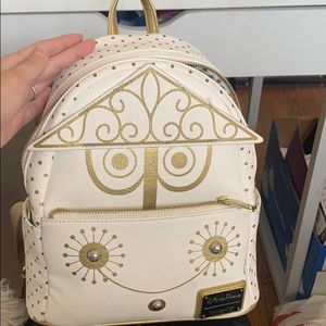 disney loungefly small world backpack